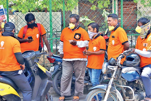 Food delivery agents fail to earn enough money for masks and gloves