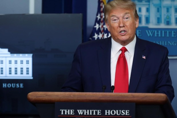 Trump says he will halt immigration, citing pandemic, as Georgia plans partial reopening