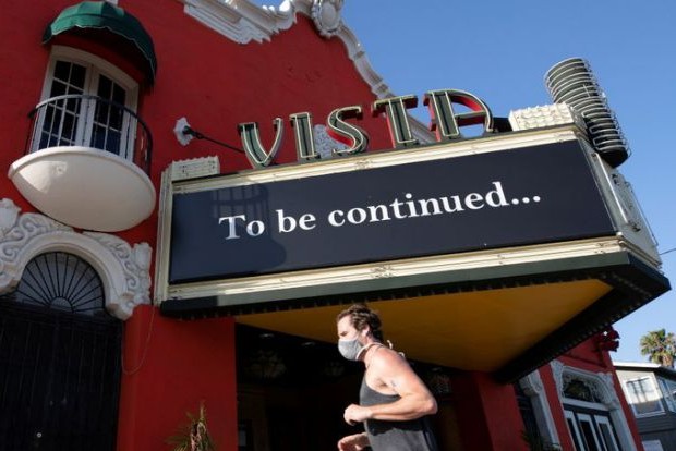 Closely watched Tenet earns critical praise as US cinemas reopen