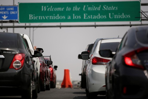Long delays at US-Mexico border crossings after new travel restrictions
