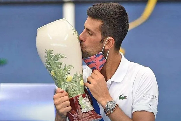Djokovic, Azarenka Clinch singles Titles