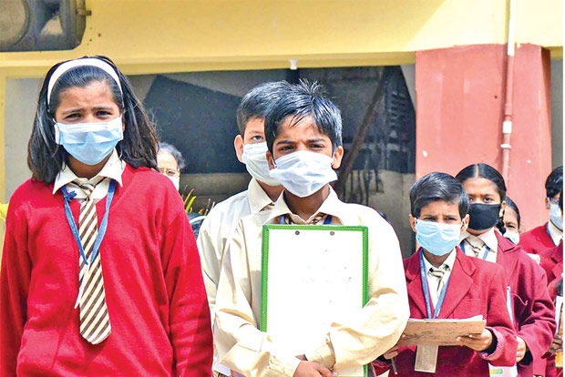 Raj: Covid positive student writes exam alone wearing PPE kit