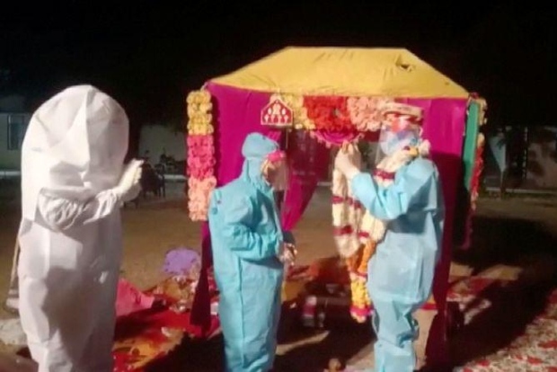 Indian wedding takes on otherworldly feel after bride tests positive for COVID-19