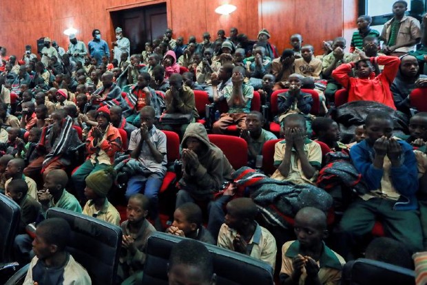Chaos and jubilation as freed Nigerian schoolboys reunite with family