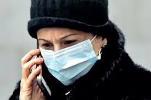 Masks alone may not stop COVID-19 spread without physical distancing, study says