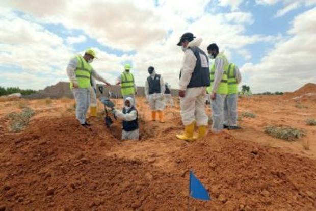 4 bodies recovered from Libya mass graves 4 bodies recovered from Libya mass graves