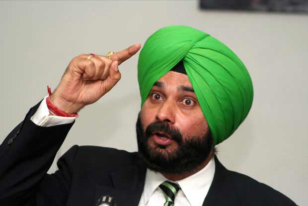 Sidhu apologises for wearing shawl with Sikh religious symbols