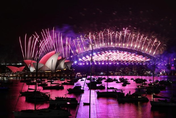 Fireworks explode over empty streets as 2020 slinks away into history Fireworks explode over empty streets as 2020 slinks away into history