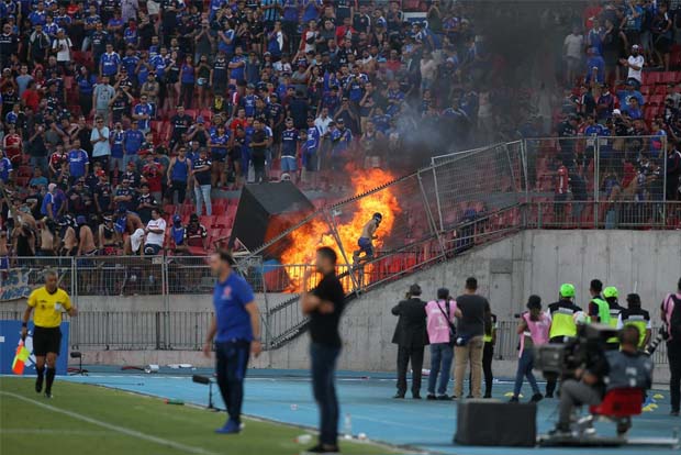 Fans set fire to seats amid Chile protests