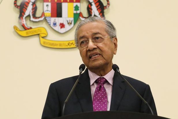Malaysias Mahathir says Parliament will pick new PM