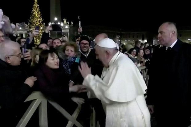 Pope says he lost patience with exuberant admirer