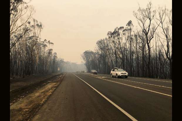 Australians flee massive bushfires as new fire threat looms