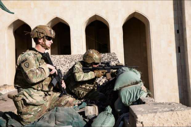 US-led coalition says paused IS fight in Iraq after rockets
