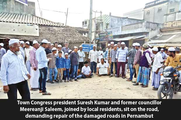 Surprise protest forces civic officials to start repair works of damaged roads