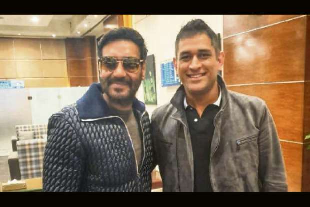 Ajay meets Dhoni: Cricket, films uniting religion of India