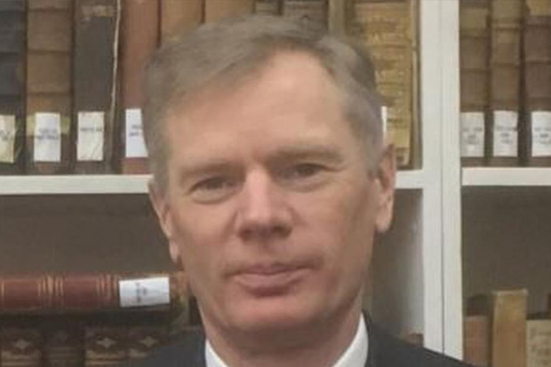 Britains Iran envoy denies attending demo before arrest