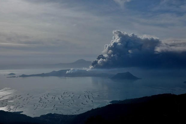 Philippines on alert as volcano spews ash, lava