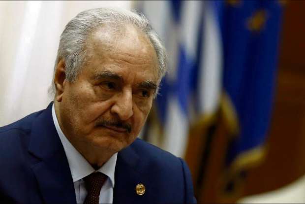 Libyan commanders forces choke oil flows, overshadowing peace summit