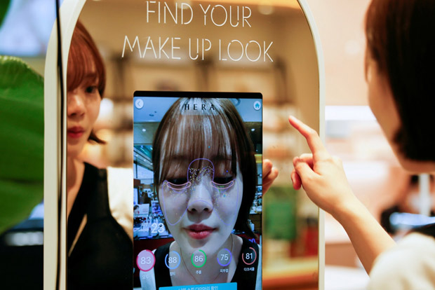 South Korean augmented reality mirror allows touchless cosmetics