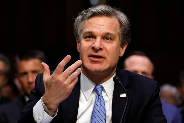 FBI chief says China threatens families to coerce overseas critics to return to China