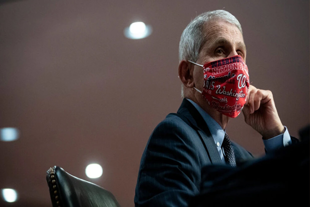 Predicaments in pandemic time: US caught between doctor and denier