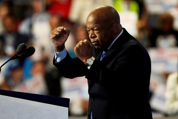 Masked mourners brave heat, virus fears to honour John Lewis