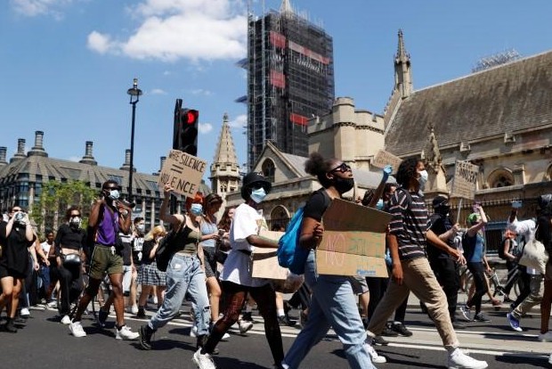 Hundreds of protesters rally in London, Berlin over U.S. death