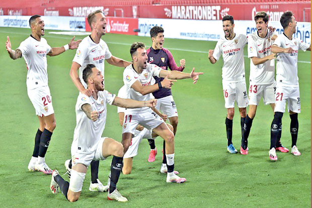 Sevilla defeats Real Betis as La Liga resumes in empty stadia