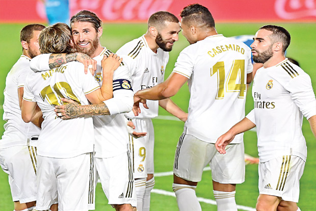 Madrid wins, keeps pace with leader Barcelona Madrid wins, keeps pace with leader Barcelona