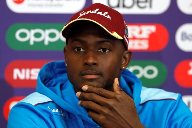 Racism should be treated like match-fixing and doping, says Holder Racism should be treated like match-fixing and doping, says Holder