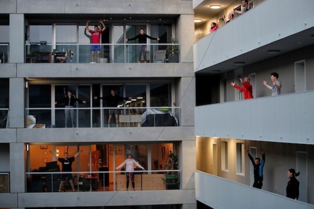 Beating lockdown inertia: French city-dwellers keep fit on balconies