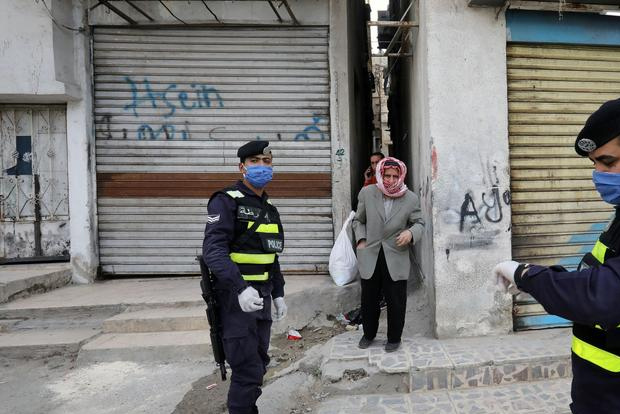 Some Spaniards to see lockdown eased as daily deaths fall again