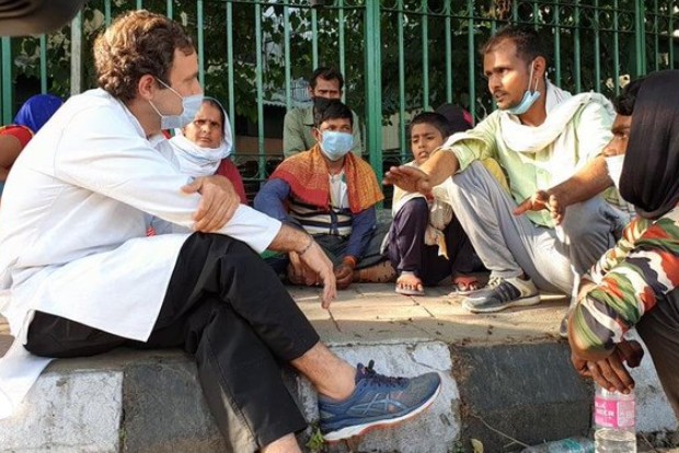 Rahul interacts with group of migrants walking back home