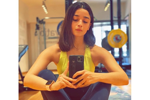 Alia gets a haircut by her multi-talented loved one
