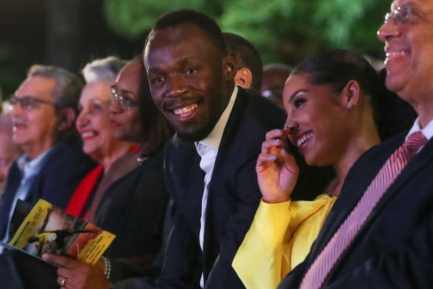 Sprint legend Bolt and partner welcome baby girl