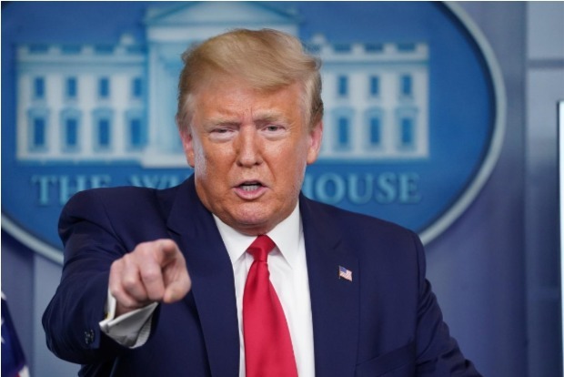 Trump threatens to withhold funding to states over mail-in voting Trump threatens to withhold funding to states over mail-in voting