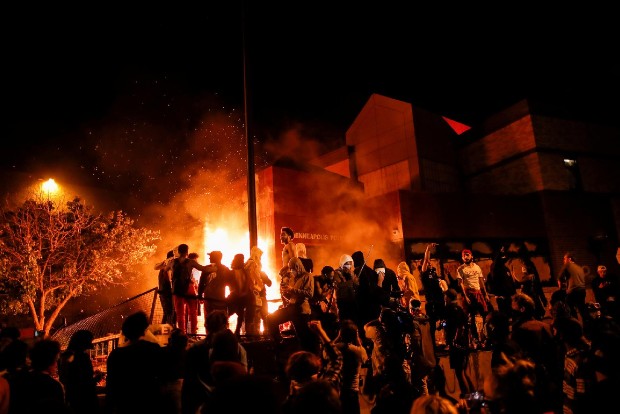 Racially charged violence rages for third night in Minneapolis