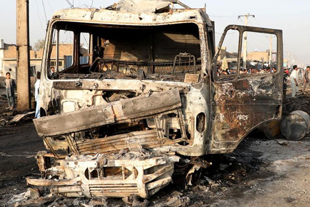 Afghan journalist and driver killed in blast