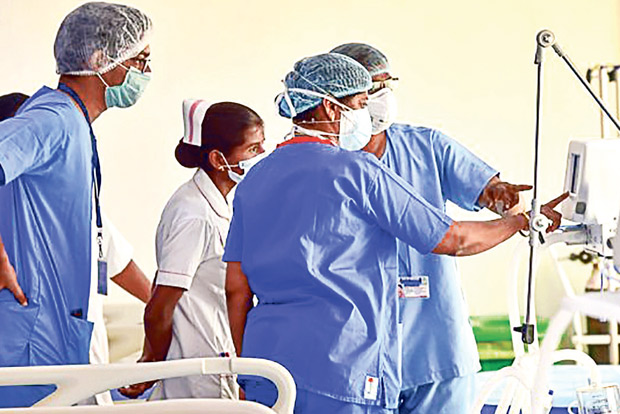 Healthcare workers to get vaccine first, distribution to take a year