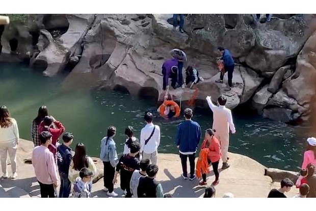 UK diplomat in China: huge relief when woman he rescued resumed breathing