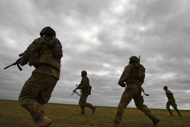 Australian minister says war crimes report on unlawful killing of Afghan civilians made her ill