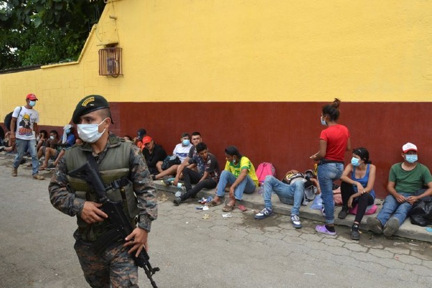 Guatemala sends over 3,000 Honduran migrants home from caravan
