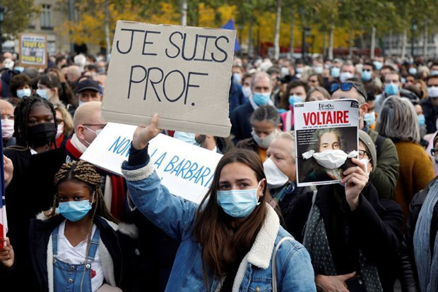 Teaching yes, bleeding no: France pays tribute to beheaded teacher