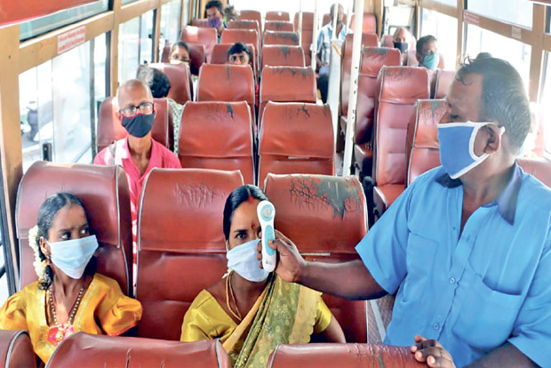 Commuters in districts avoid buses on day one of service resumption Commuters in districts avoid buses on day one of service resumption