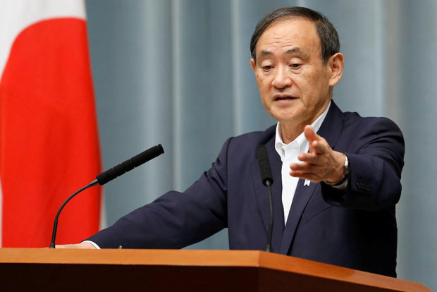 New Japanese PM Suga urges Putin to resolve island dispute