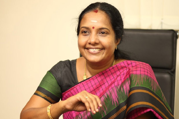 Complaint against BJP candidate for sporting lotus emblem on sari while voting Complaint against BJP candidate for sporting lotus emblem on sari while voting