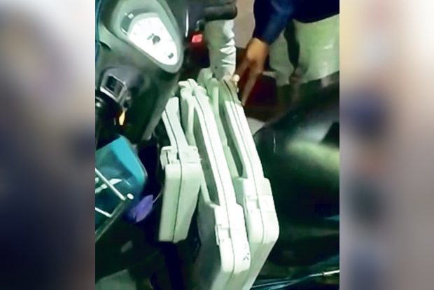 Motorists secure duo on scooter with EVMs, VVPAT