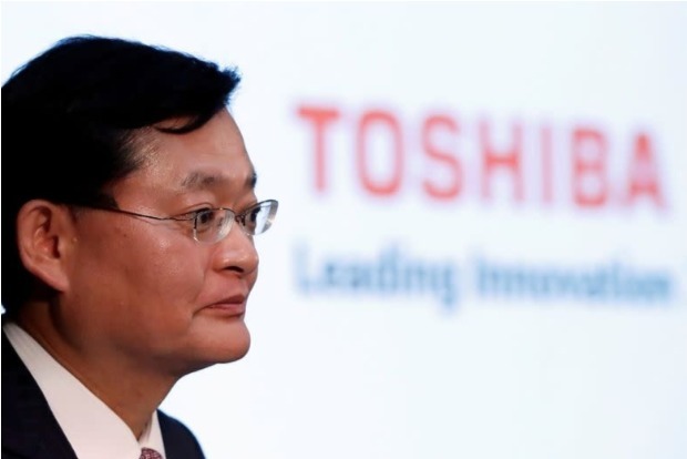Japans Toshiba president steps down amid acquisition talks