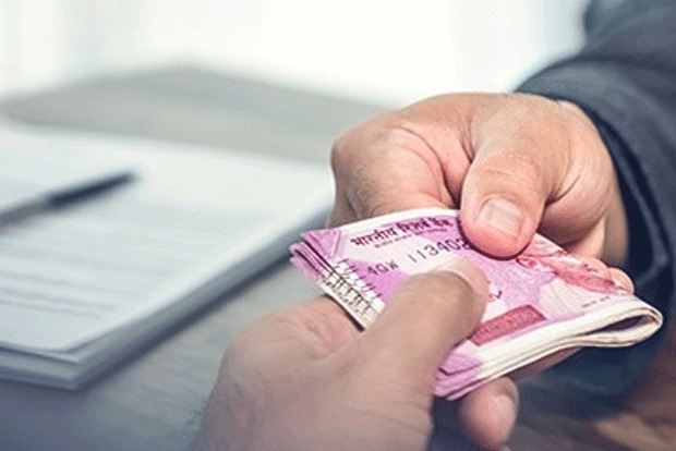 Registration dept officials caught red-handed while taking bribe