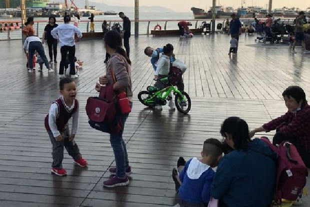 China allows couples third child amid demographic crisis